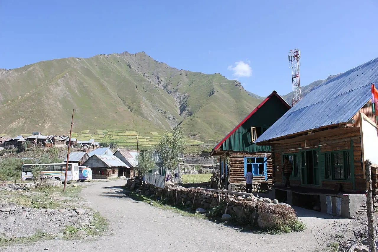 A quiet village in Gurez Valley with mountains behind